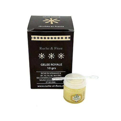 pot de 10g de gelée royale fraîche, sa cuillère doseuse et son emballage isotherme en polystyrène et en carton